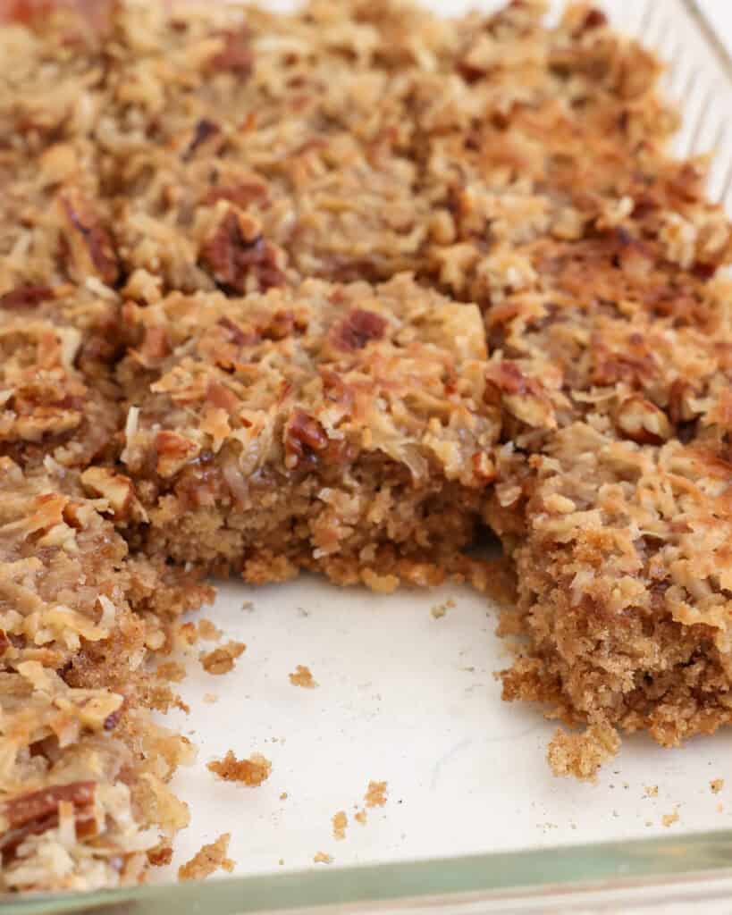 Slices of oatmeal cake in a glass pan. 