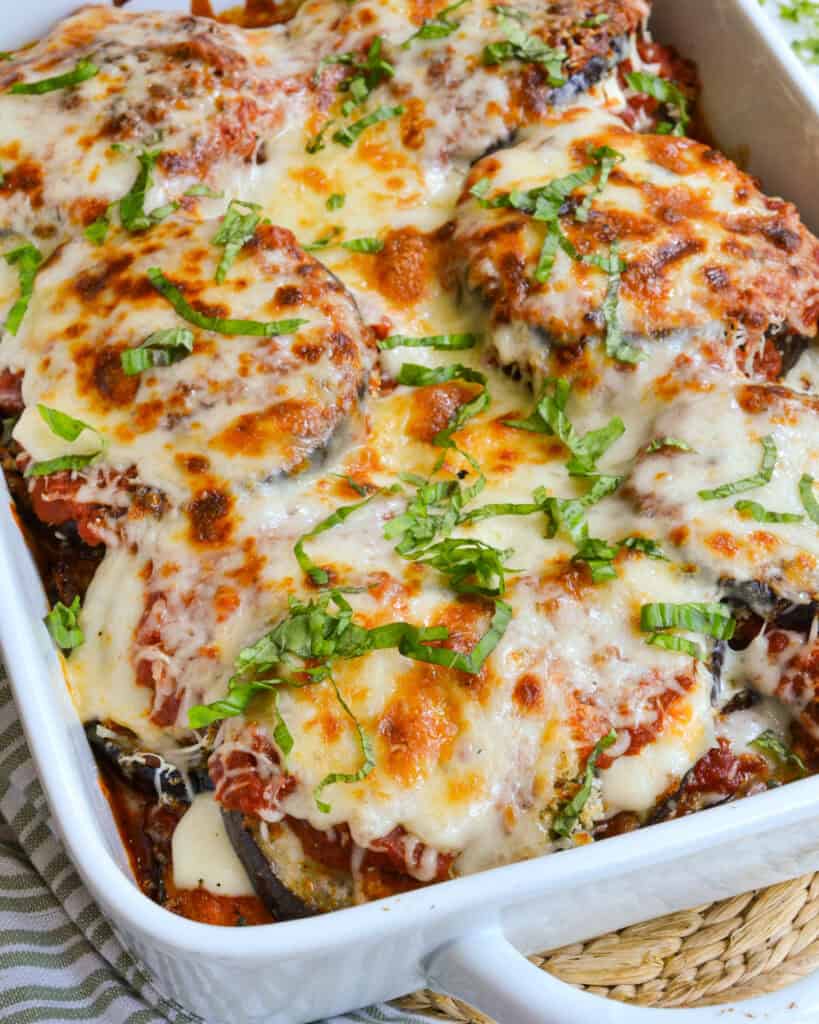 Eggplant parmesan in a large casserole dish.