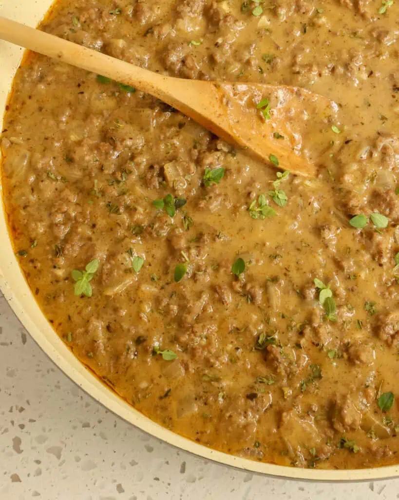 A skillet full of homemade hamburger gravy. 