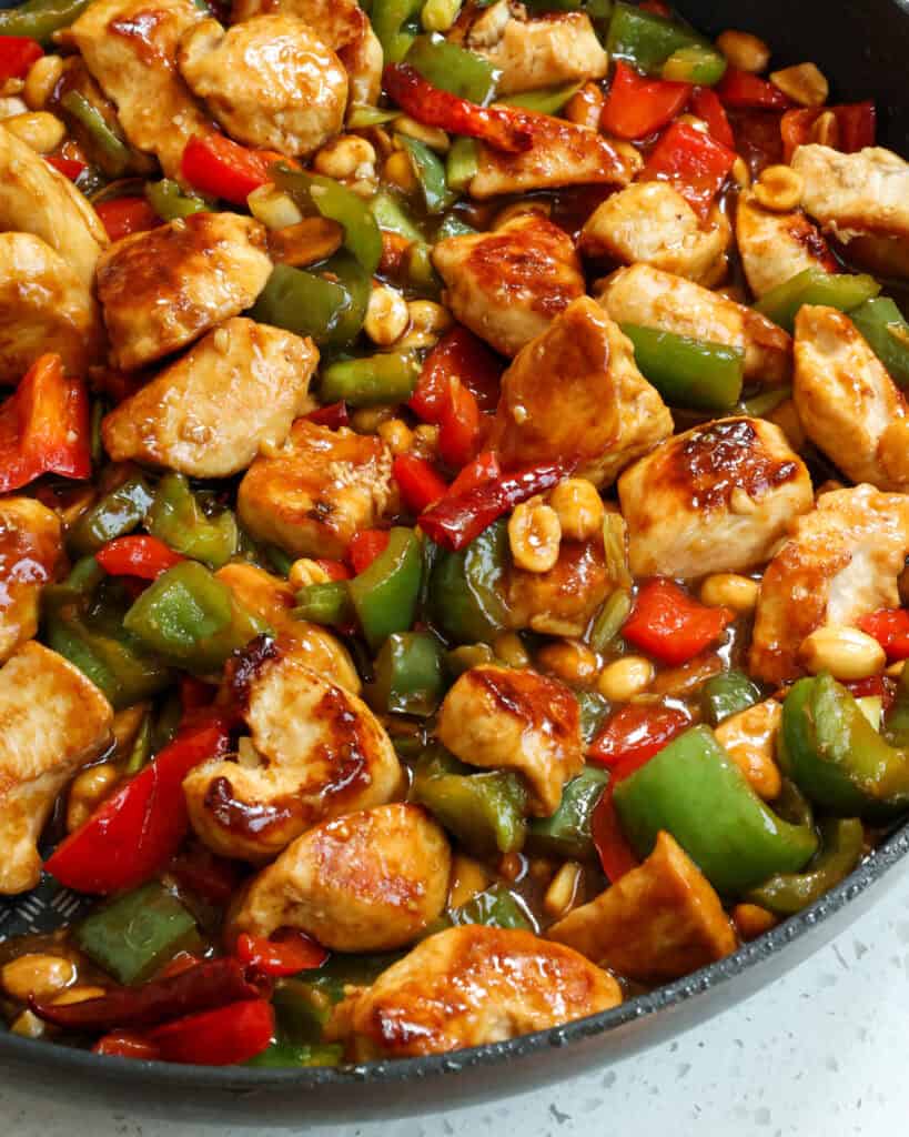 One Skillet Kung Pao Chicken Kung Pao Chicken is the ultimate stir fry experience. It is loaded with delicious peppers, scallions and peanuts in a sweet and salty slightly spicy sauce. Make this favorite takeout dish at home for a delicious experience!