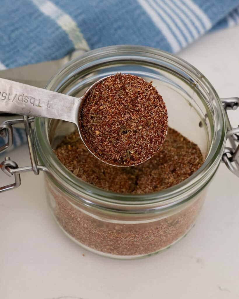 A tablespoon full of homemade steak seasoning. 