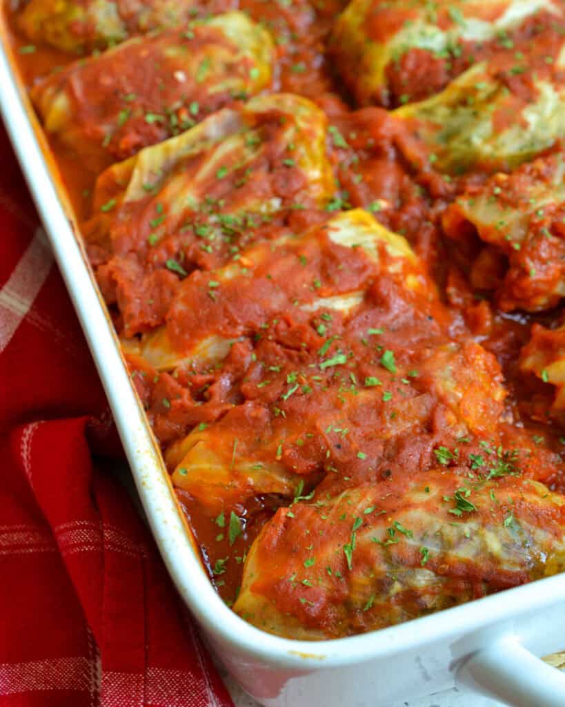 Cabbage rolls in a casserole dish. 