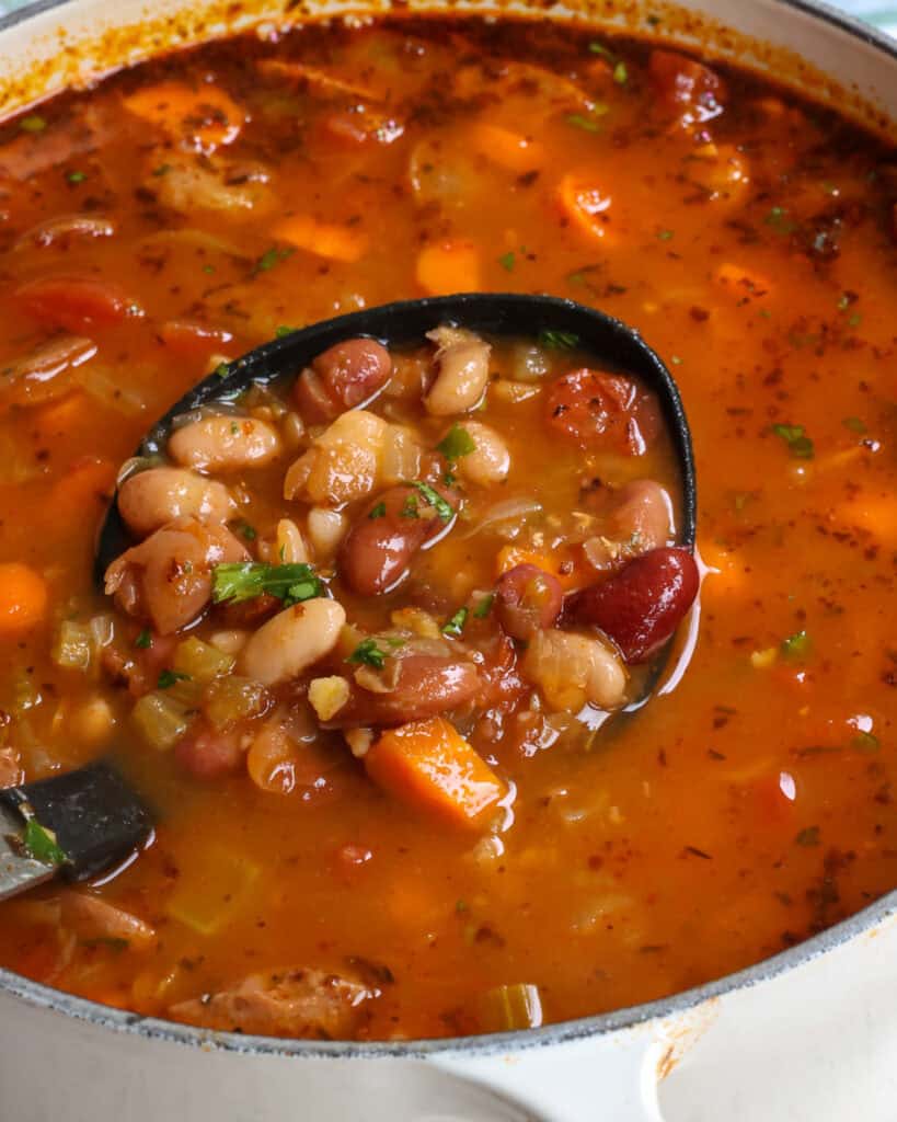 A Dutch oven full of 15 bean soup.