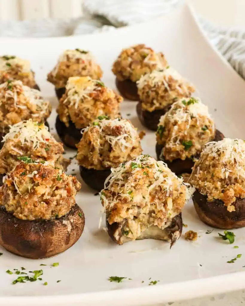 Sausage stuffed mushrooms on a serving platter