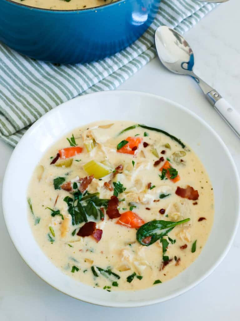 A single serving bowl full of crack chicekn soup. 