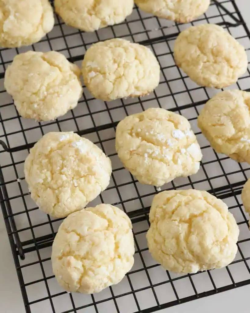 A cooling rack full of gooey butter cookies.