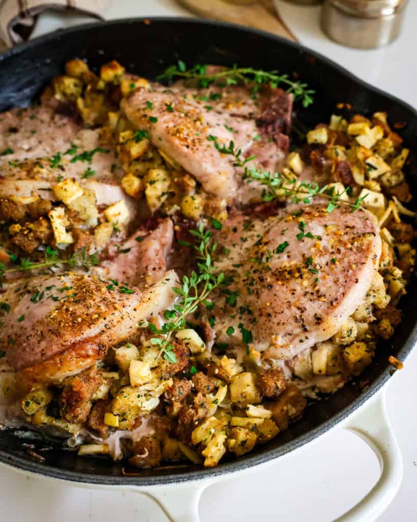 Stuffed pork chops with apples, onions, celery, and fresh herbs in a bread stuffing.