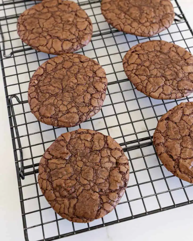 Brownie cookies on a wire cooling rack.