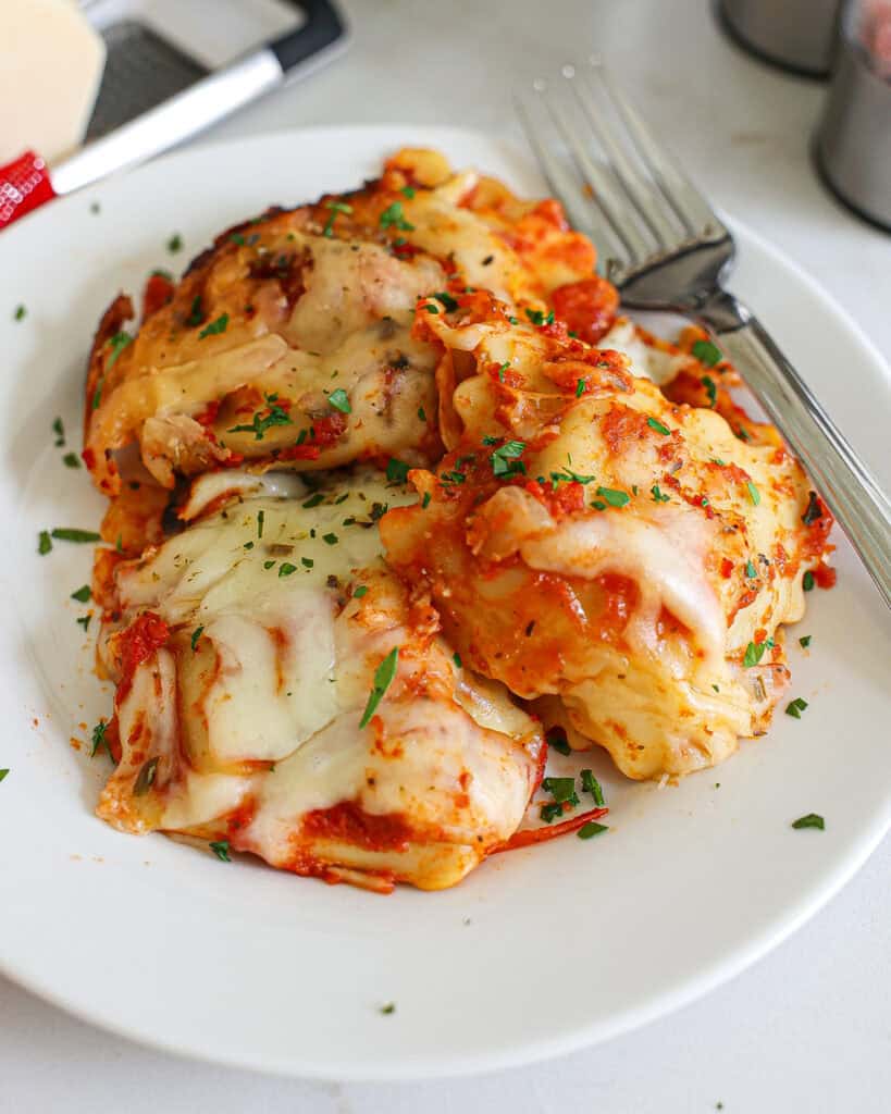 Crockpot Ravioli Lasagna on a white serving plate. 