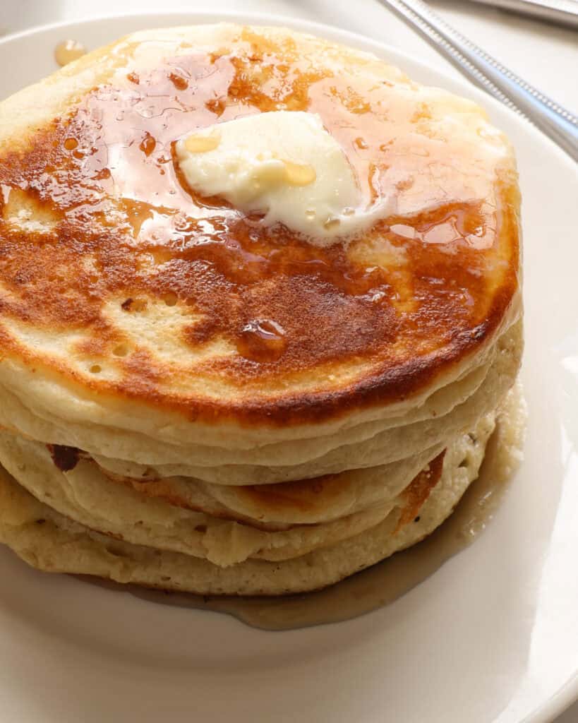 A close up view of protein pancakes on a plate. 