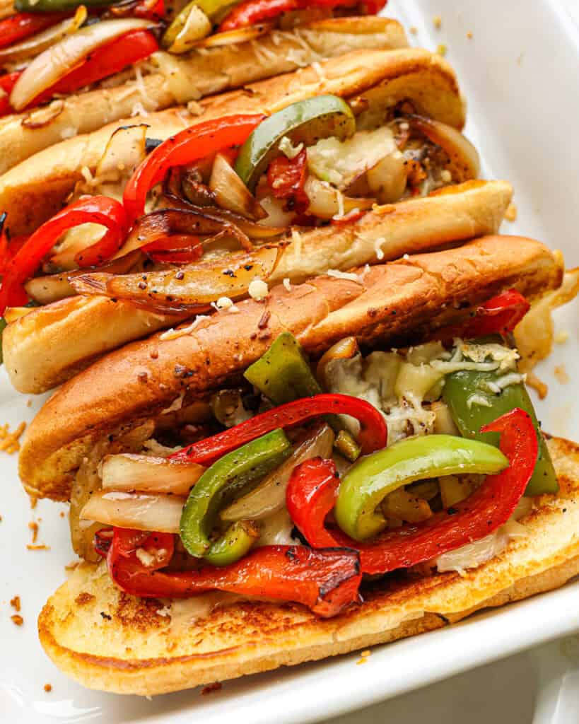 Italian sausage sandwiches in a 9x13  inch casserole dish. 