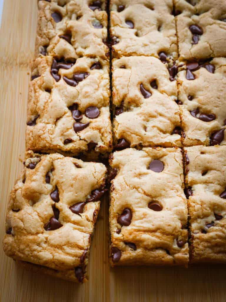 A close up overhead view of chocolate chip cookie bars.