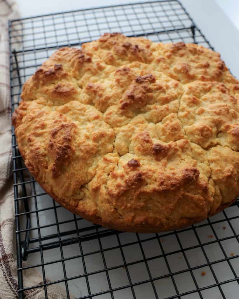 Cathead biscuits on a cooling rack.