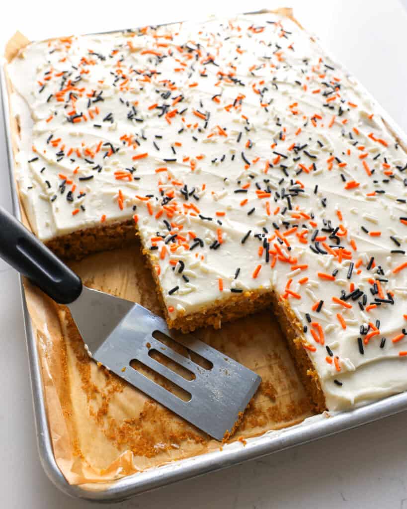 An overhead view of a jelly roll opan full of pumpkin bars.